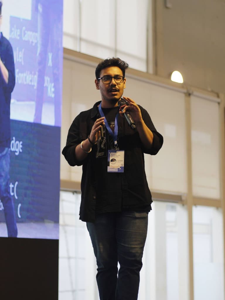 Imran Roshan speaking at a conference